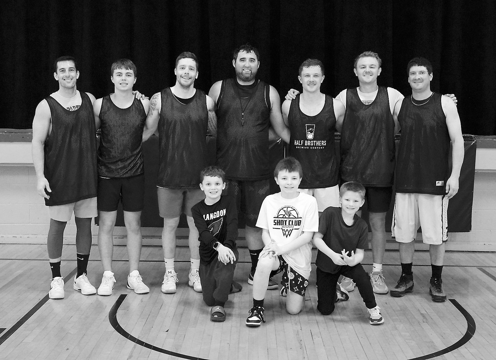 The Langdon Team that took home 2nd place at the Amateur Basketball Tourney held in Munich on April 12. Players (L-R) Zack Schaefer, Dawson Downs, Nick Schaefer, Justin Overby, Jacob Delvo, Jackson Delvo, Justin Flink; front row: Coaches Jack Schaefer, Jaxtin Overby, and Miles Flink. Photo by Larry Stokke.