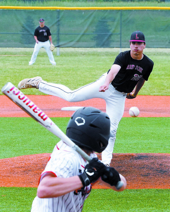 Mason Romfo pitches a strike in the Legion tournament in Park River. Photo by Larry Stokke.