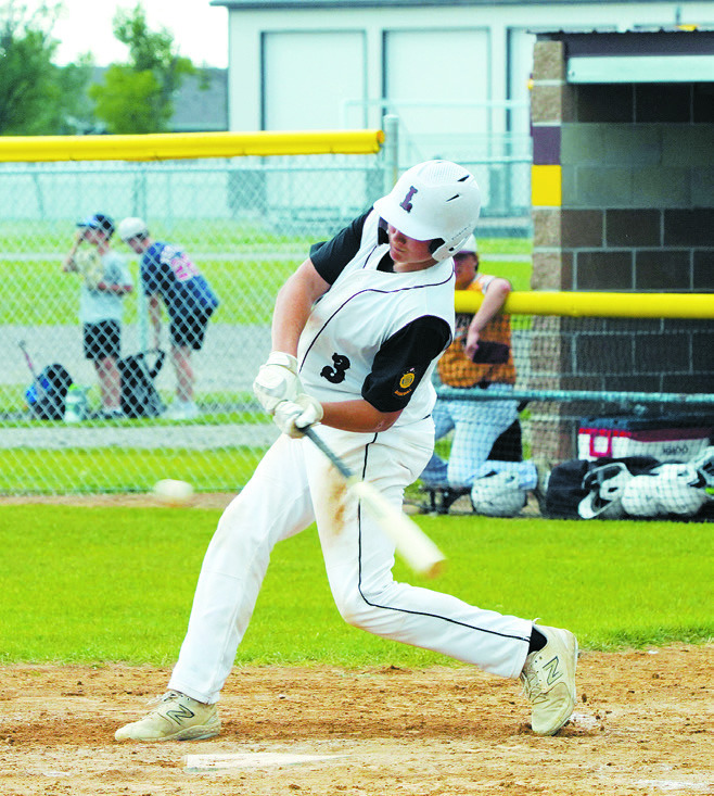 Landon Schneider drives the ball into the outfield for a base hit. Photo by Larry Stokke.