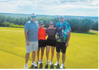 From left, Joel Smith, Kelsey Smith, Allison Smith and Mike Smith finished third at the Walhalla Swimming Pool Fundraiser Golf Tournament on July 11. Submitted photo