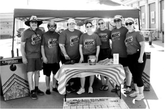 Chamber members from left Dave Bakke, Charlie Turner, Kayce Schlittenhard, Morgan Zeis, Courtney Krom, Anna Marie Lill, Brandi Mittleider (not pictured Ryan Beattie and Janelle Borho) Photo by Larry Stokke