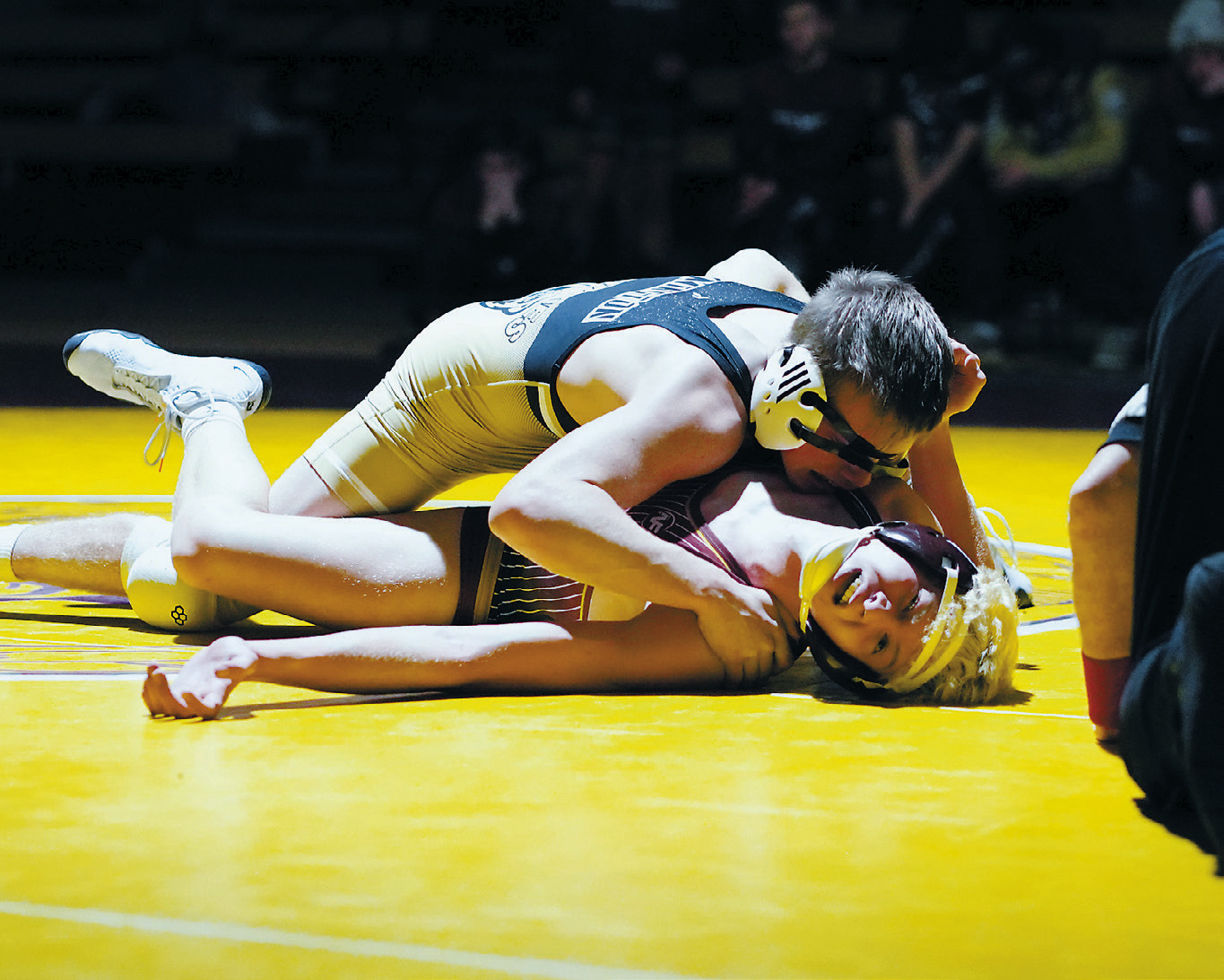 Gavin Symington only took approximately 39 seconds to pin his Watford City opponent. Photo by Larry Stokke. Zeke Symington, with his ear protector pulled over his eyes, made short work of his opponent with a pinfall in Belcourt at the Kyle Hardy Memorial Tri-Angular. Photo by Larry Stokke.