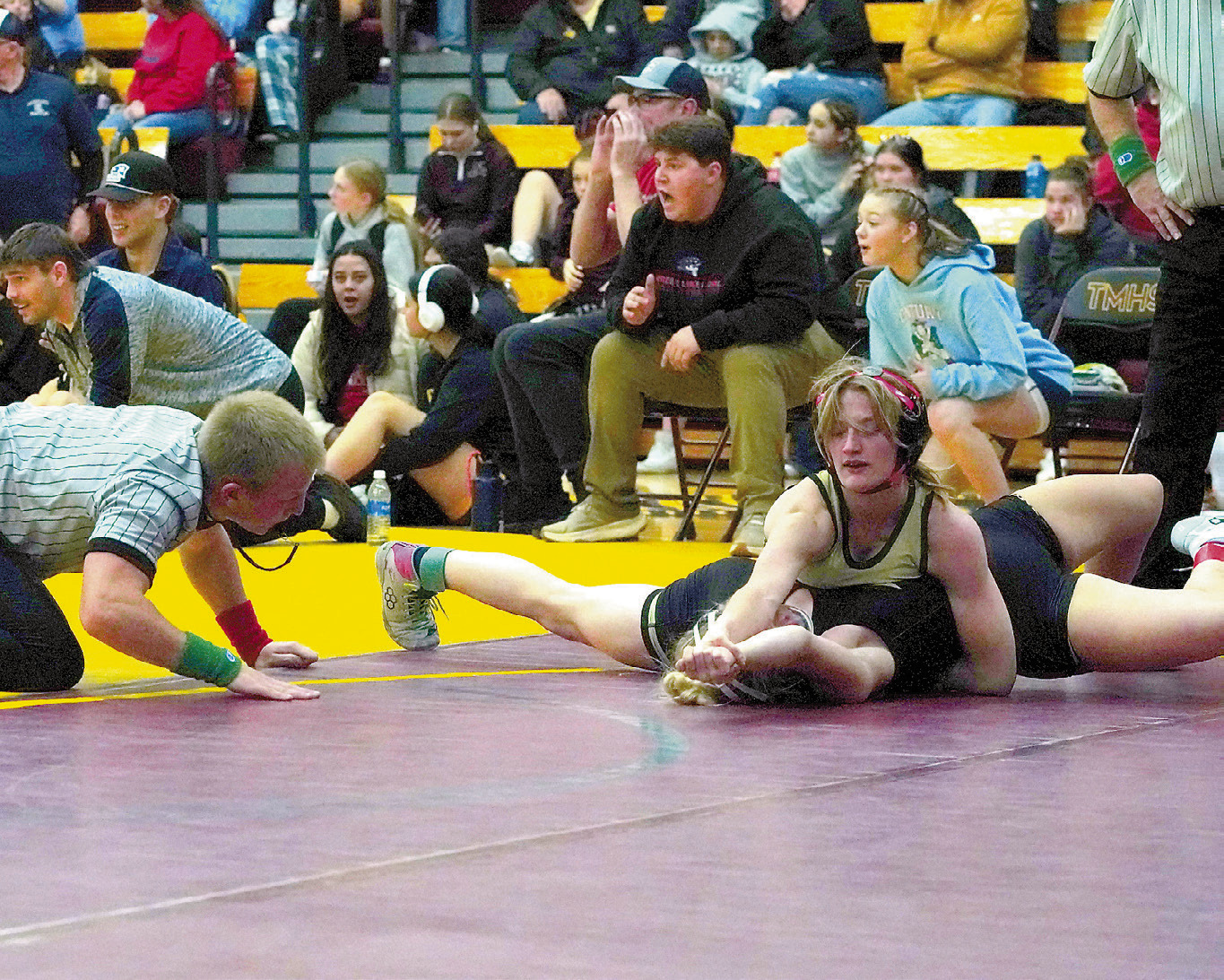 Dannika Bennett made short work of her opponent, quickly pinning her for the win. Photo by Larry Stokke.