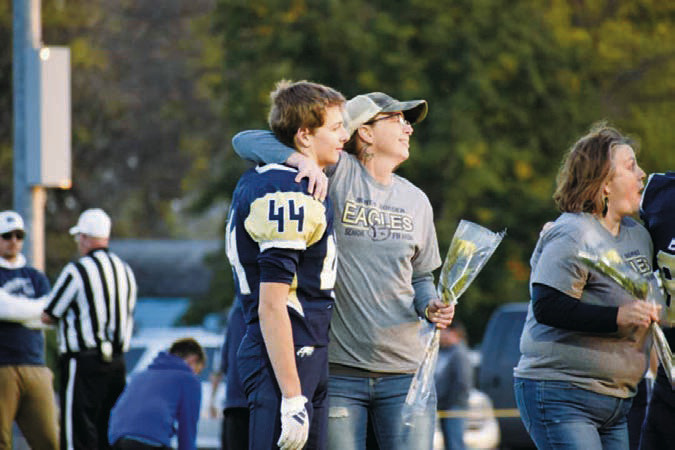Zaiden and Desiree Kintyhtt during senior night. Photo by Ashley Schafer.