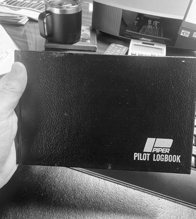 Bob’s pilot log book.