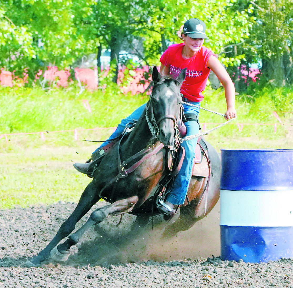 Jacey Nelson on Butters was the big money jackpot barrel stake winner. Photo by Larry Stokke.