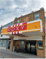 The historic Roxy Theater marquee lights up downtown Langdon. The theater hosted the final concert of the Northern Lights Arts Council Summer Concert Series on June 11 after weather prompted organizers to move the performance indoors.