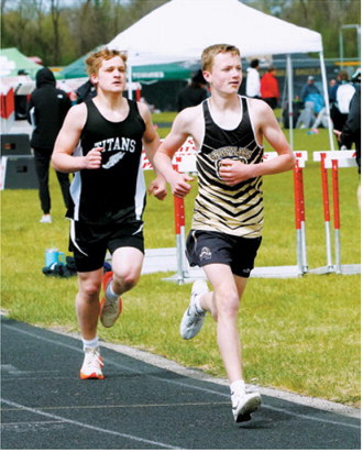 Nolan Pelletier ran to a personal-best time of 5:25 in the 1,600-meter run at the regional meet for the PCN Grizzlies. Photo by Larry Stokke