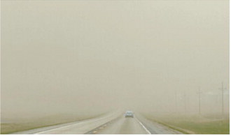 Strong winds and blowing dust swept across northeast North Dakota on May 13 and 14, reducing visibility and creating hazardous travel conditions throughout the region. Submitted photo