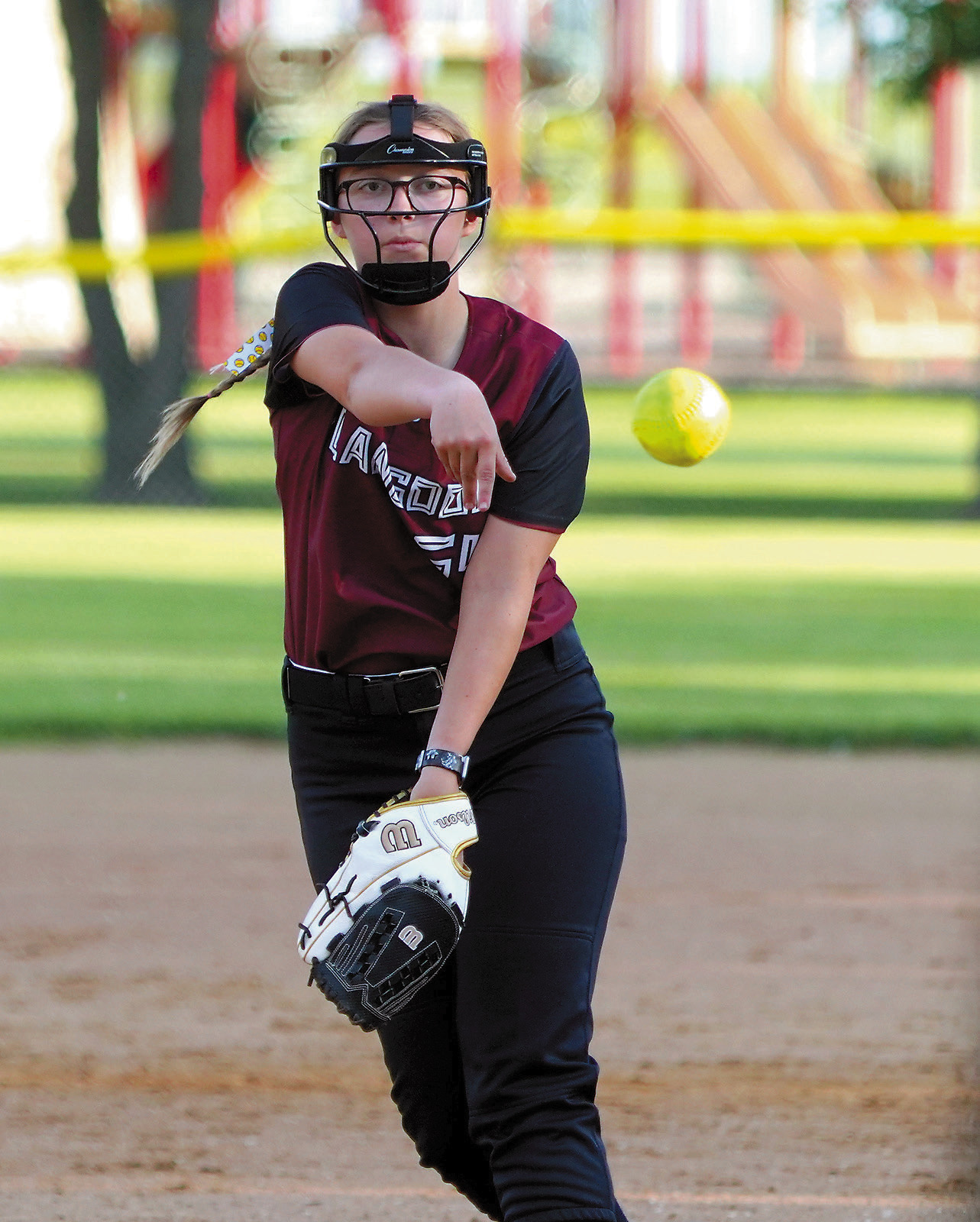 Nadia Lewis delivers a strike to the plate during Langdon Area/Munich's victory over Larimore on June 25 in Munich. Photo by Larry Stokke