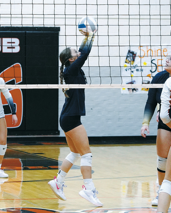 Adrienne Longtin finished the game with 20 assists against the Tornadoes. Photo by Larry Stokke.