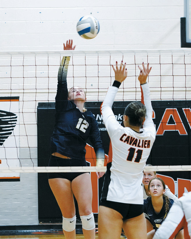 Jacy Fraser slams down one of her seven kills in the play-in game against the Tornadoes. Photo by Larry Stokke.