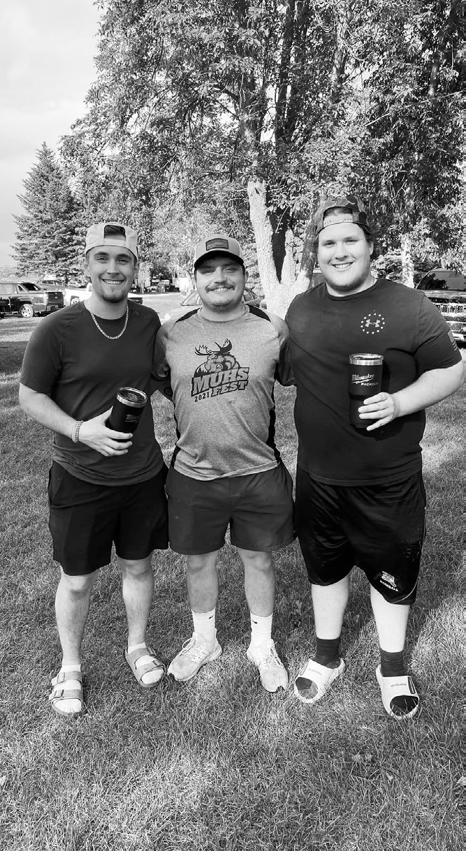 (L-R) Noah Benjamin, Danny Muhs, and Cole Darling. Benjamin and Darling won the cornhole tournament at this year’s Muhs Fest.