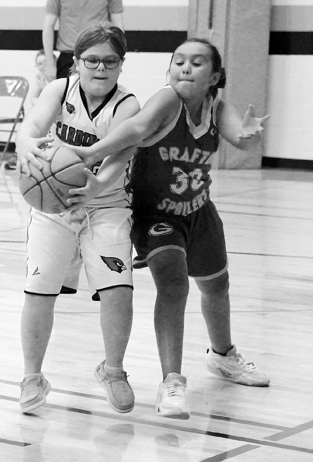 Andrea Finnson fights for a loose ball against the Spoilers on Oct. 2 in Langdon. Photo by Larry Stokke.