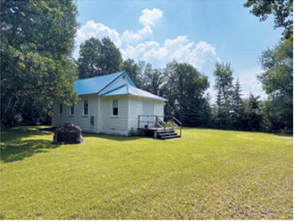The Nore Numedahl Lutheran Church stands among the well-maintained grounds of the rural cemetery in Fremont Township. Photo submitted by Cory Lien