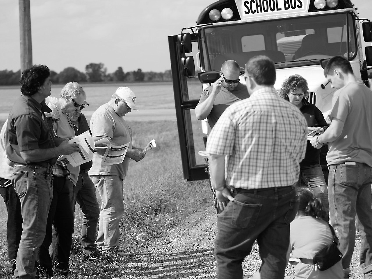 A Walsh County Soil Health Tour brought together 40 participants to learn more about soil loss, erosion and soil health in July 2023. Here, Naeem Kalwar [left side in the green shirt], a soil health specialist from the NDSU Langdon Research Extension Center, leads the talk. Photo provided by Josh Anderson, Walsh County district conservation manager.