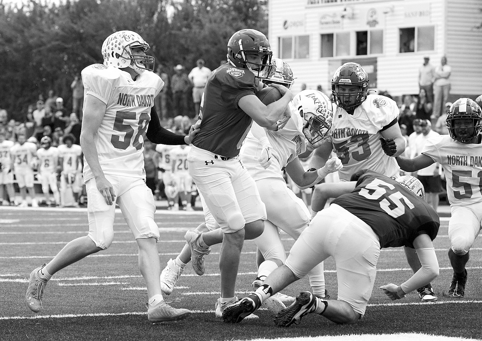 Rayce Worley scores his second TD of the game and was named Offensive Player of the Game. Photo by Larry Stokke.