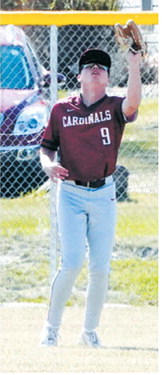 Dawson Downs makes a catch for an out during the Cardinals’ win over the Aggies. Photo by Larry Stokke