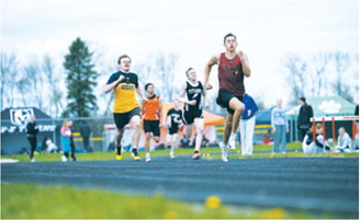 Tanner McDonald placed sixth in the 400-meter dash at the regional meet for the Langdon Area/Munich Cardinals. Photo by Ashley Schafer