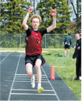 Kade Johnson recorded a jump of 34 feet, 3 1/2 inches in the triple jump at the regional meet in Mayville for the Langdon Area/Munich Cardinals. Photo by Larry Stokke