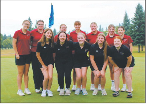 The Langdon Area Cardinals girls golf team celebrates a first-place team finish at the Langdon Invitational on Monday, Aug. 24. Photo courtesy of Jennifer Romfo