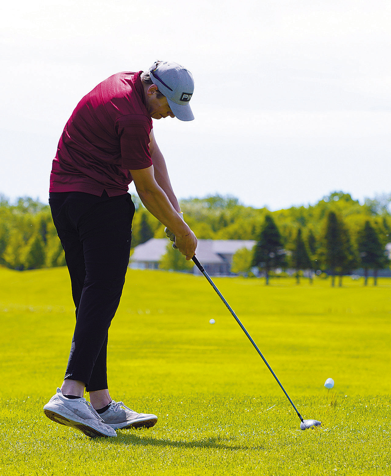 Rayce Worley at the state golf tournament representing the Cardinals. Photo by Larry Stokke.