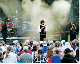 Performers take the stage during the Off the Charts music festival, entertaining the crowd with an evening of live music. Photo by Larry Stokke
