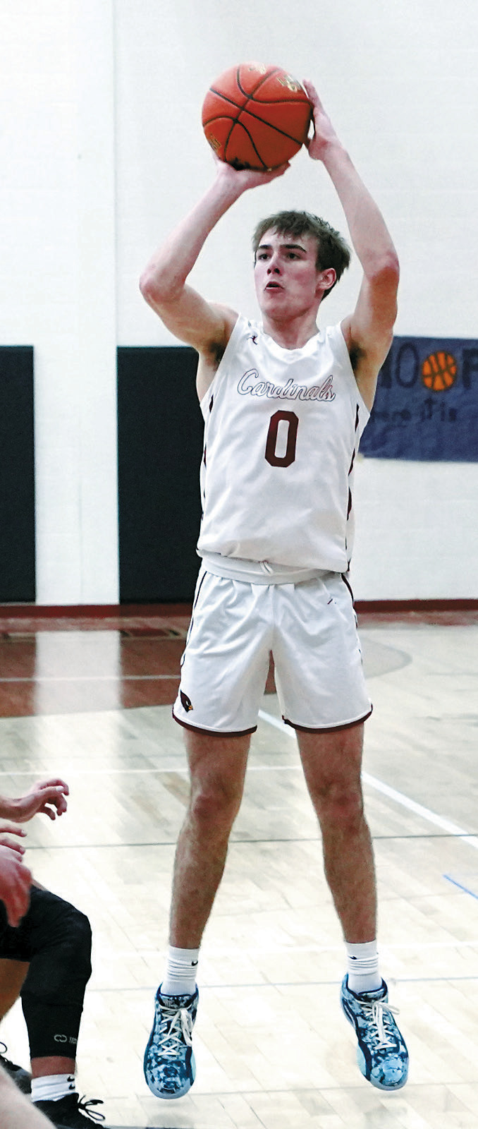 Jayden Lee gets the Cards going with a 3-point shot and finished with 12 points in the win over DVE. Photo by Larry Stokke.