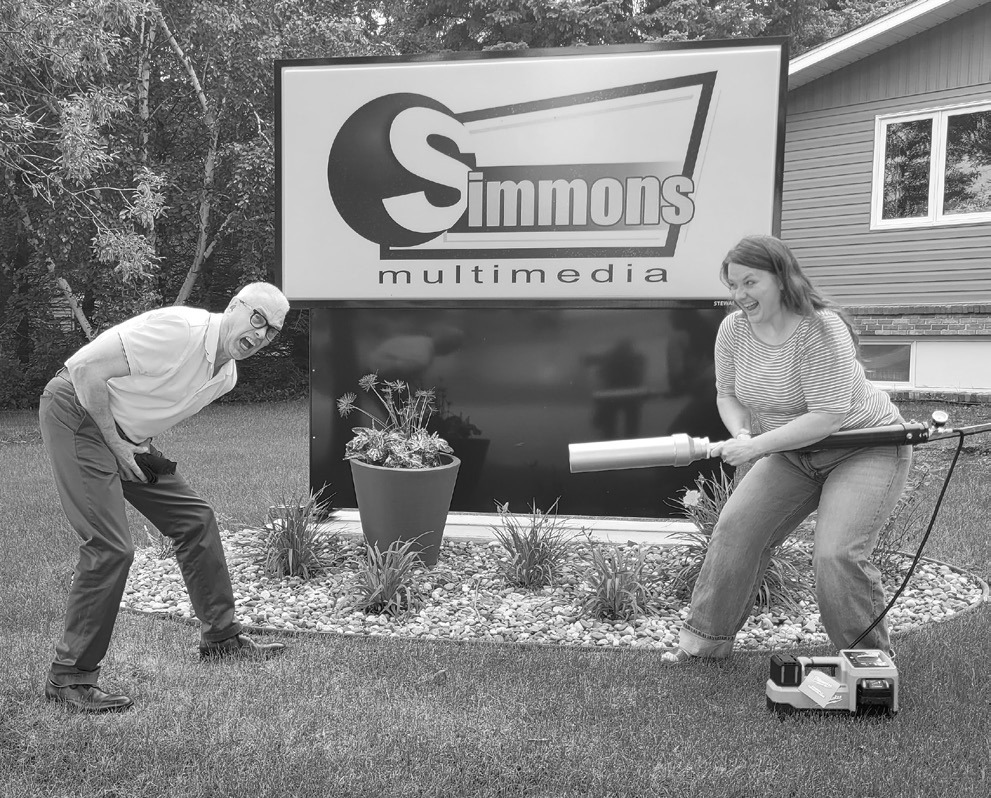 Bazooka Brandi shoots Bob with a T-shirt cannon. That's got to hurt.