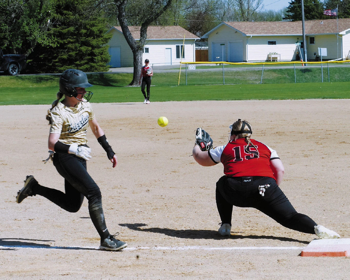 Claire Melhoff puts out a Grizzly at first base in Munich in the Cards' loss to the Grizzlies. Photo by Larry Stokke.