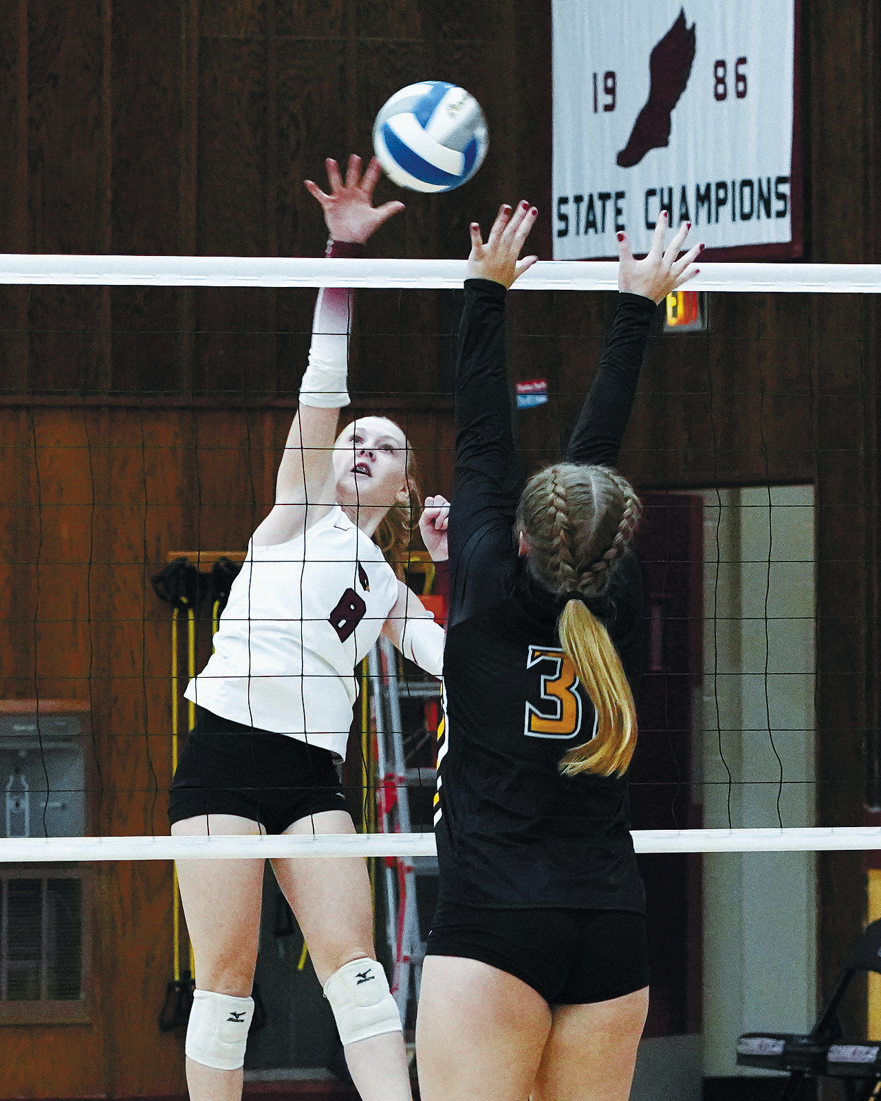 Hilary Haaven with one of her 19 kills to go with her 22 digs in the win over Park River. Photo by Larry Stokke.