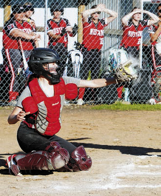 Bridget Pankratz had a great game behind plate in the win over Park River. Photo by Larry Stokke.