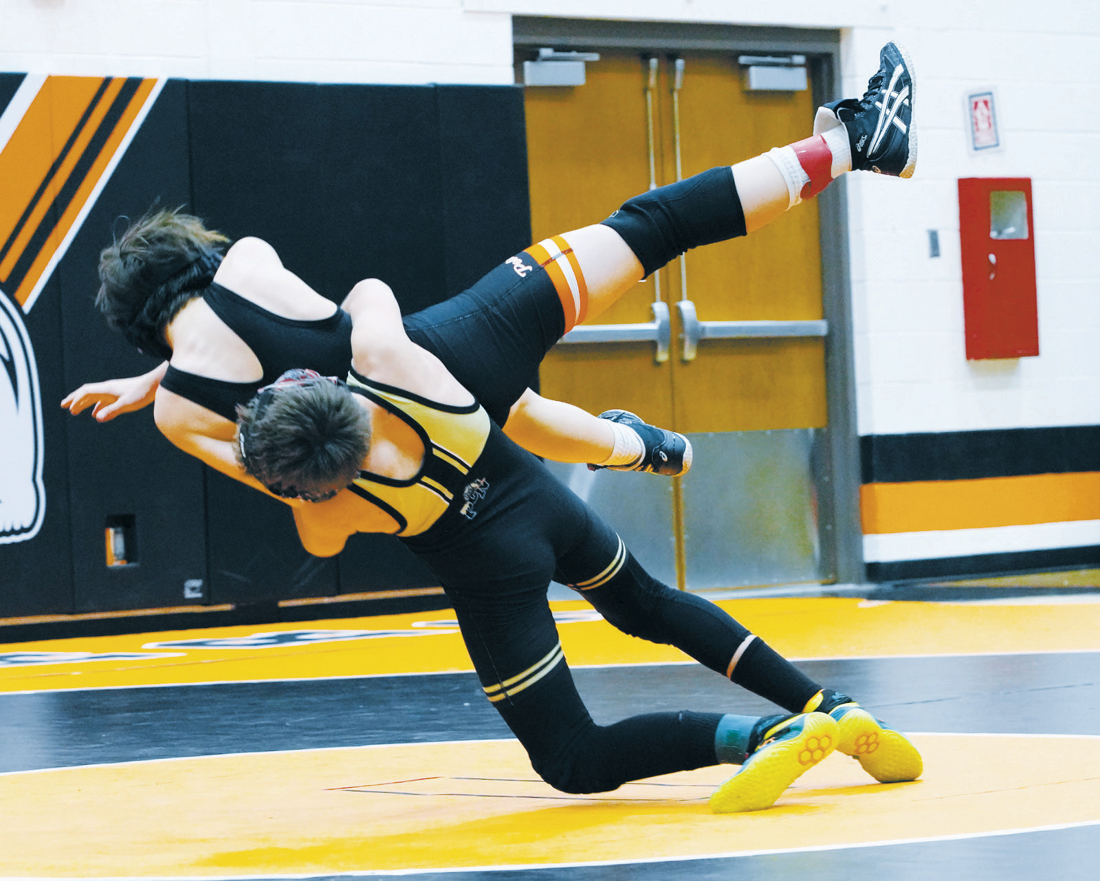 Johnny Robinson powers his Larimore opponent to the mat for a win by pinfall in on Dec. 5. Photo by Larry Stokke.