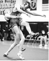 Henry Kemnitz powers his man off the ground and went on to win by a pin fall. Photo by Larry Stokke