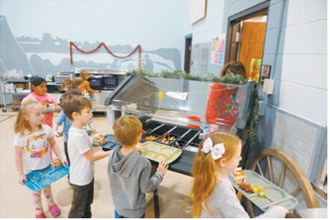 Students at Roosevelt Elementary School in Bismarck line up for lunch. (Photo Michael Standaert)