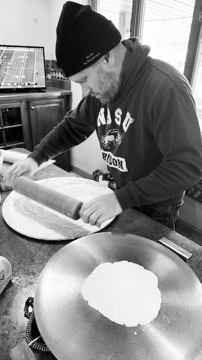 The lefse rolling expert.