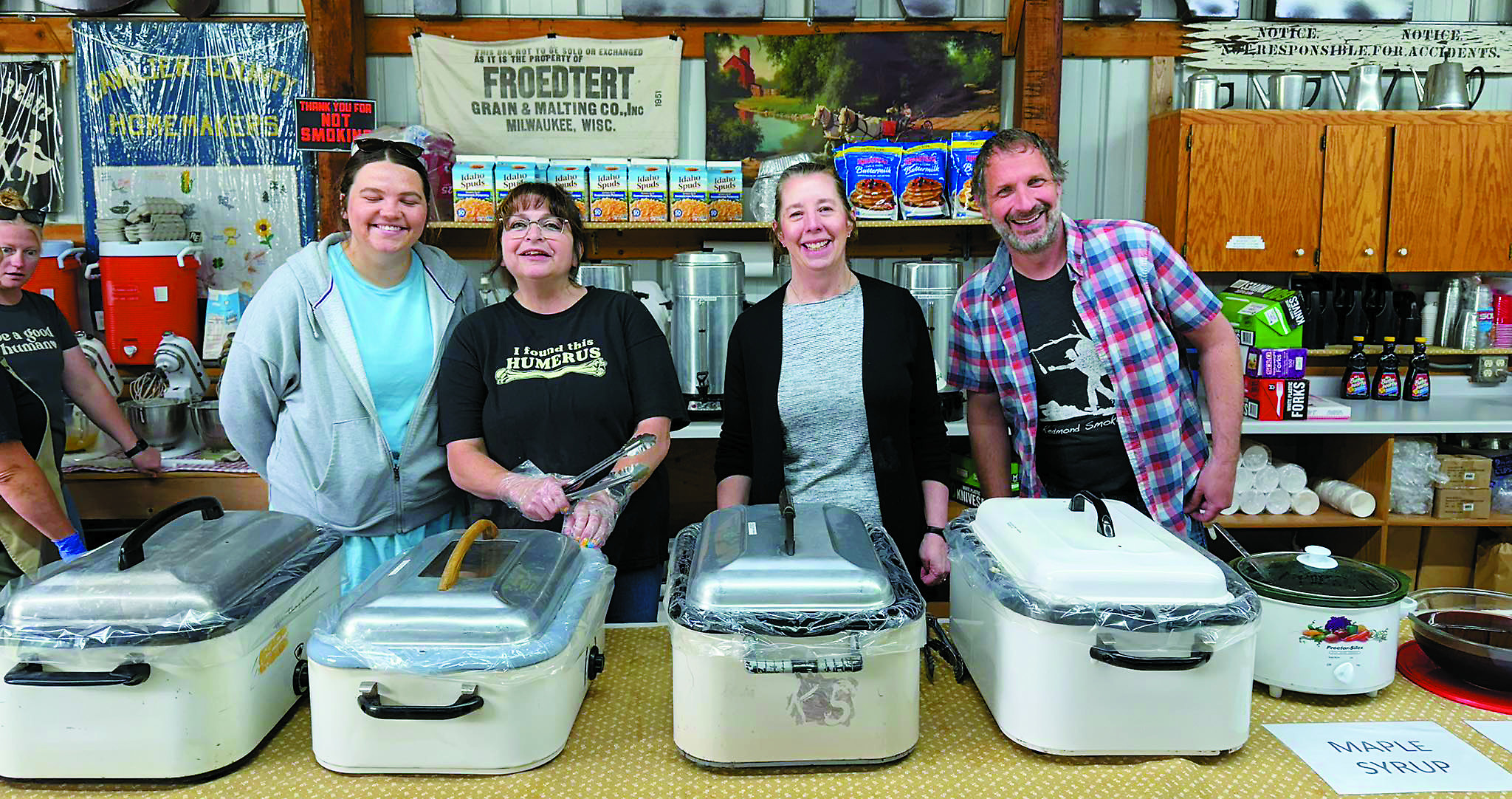 Volunteers Josie, Kari, Barb, and Terry working the line at the Father’s Day Breakfast in Dresden. Photo by Shauna Schneider.
