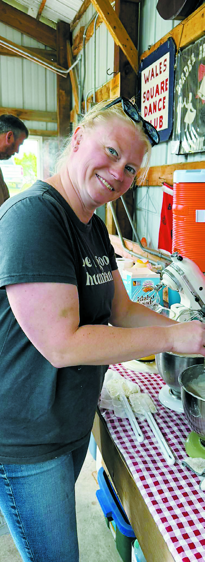 Danielle works on mixing batter for the pancakes. Photo by Shauna Schneider.