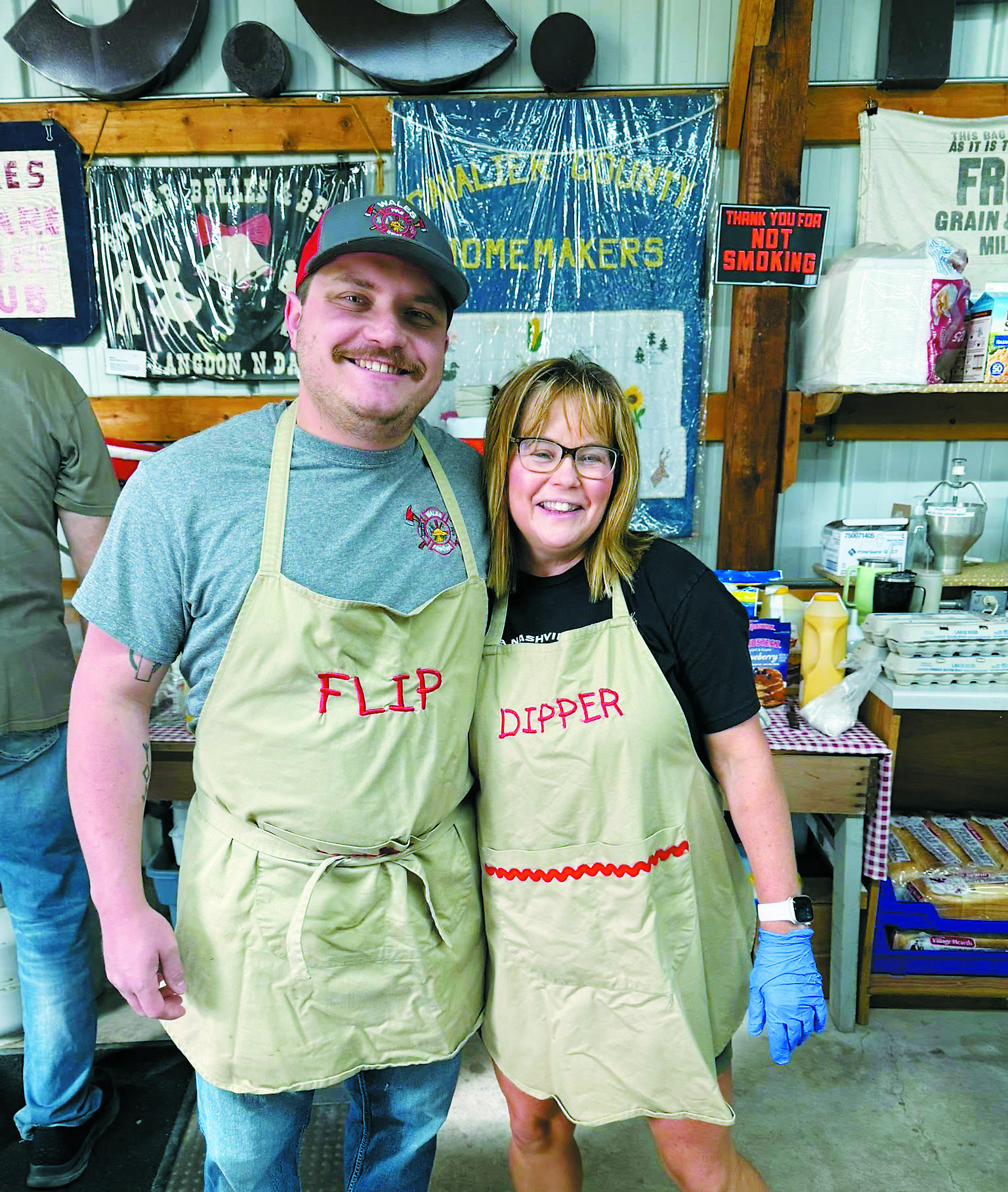 The flip (Danny Muhs) and dip (Stacy Dubois) team worked hard at the breakfast in Dresden. Photo by Shauna Schneider.