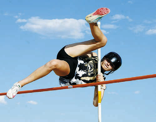 Addy Manley's pole vault score qualified him for the State Meet. Photo by Larry Stokke.
