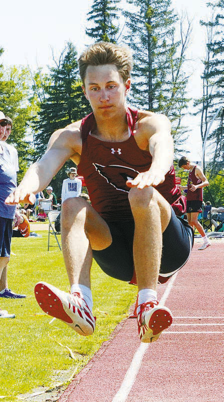 Tanner McDonald qualified in triple jump and 300M hurdles. Photo by Larry Stokke.