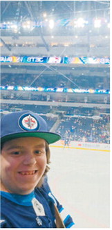 Lance Waters III and Lance Waters II at the Winnipeg Jets game on Jan. 20. Submitted photo