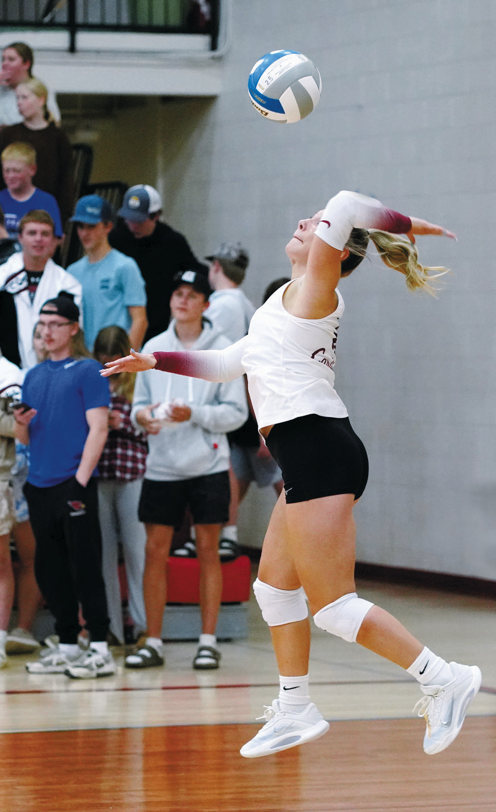 FM Bank's Player of the Game Raeleigh Ratzlaff had a great game with three aces and eight digs. Photo by Larry Stokke.