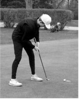Ryland Peterson putts during golf action in Larimore on May 15 and finished the meet with an 86. Photo by Larry Stokke