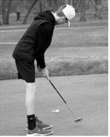 Porter Pritchard lines up a putt during the Turtle River Classic on May 14 and finished the day with an 87. Photo by Larry Stokke