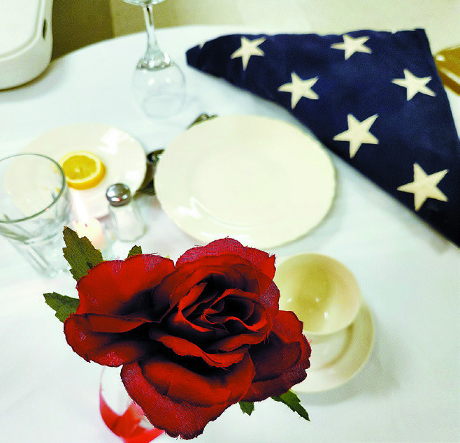The table setting in honor of the fallen at Langdon's Post 98 Memorial Day Program. Photo by Hilary Nowatzki.