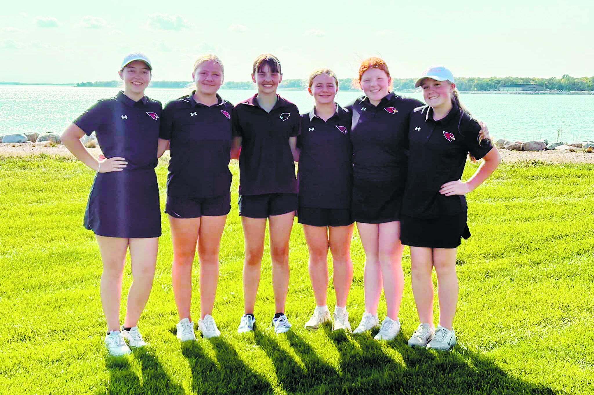 The Cardinals golf team (L-R) Nadia Lewis, Colby Forest, Lily Zimmer, Harper Jacobson, Stella Busse, and Finley Crockett at the Regional Golf Meet in Devils Lake on Sept. 16.