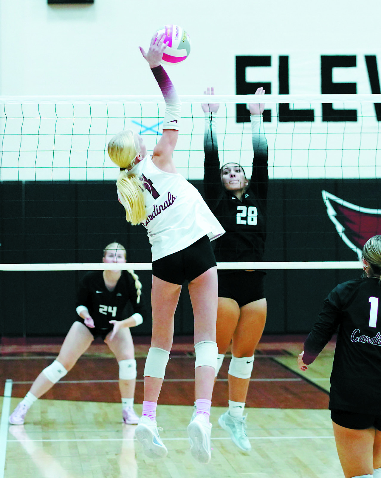 Mya Swanson had a great game with five kills, two aces and eight digs in the Cards' win over Nelson County. Photo by Larry Stokke.