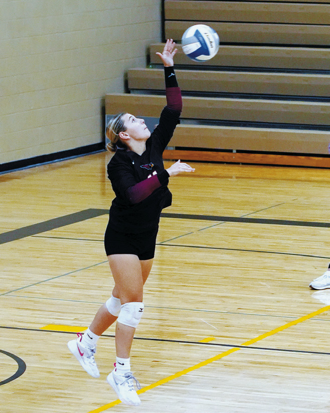 Raeleigh Ratzlaff serves an ace at the Northern Cass Tournament. Photo by Larry Stokke.