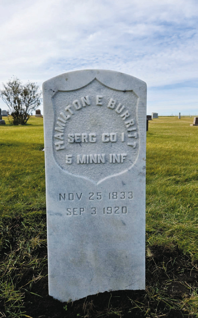 Photo of the newly erected memorial. From (L-R) Earl “Butch” Welsh, Justin Ullyott, Leon Hiltner, Harvey Metzger, Larry Murie, Darrel Kempel, and Anna Spivey.
